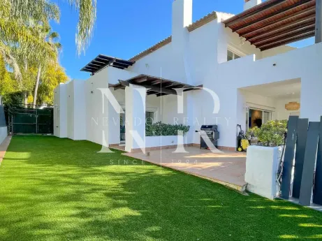 Corner townhouse with mountain views in a gated community on the Golden Mile.